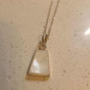 Elegant Silver and Cream Pendant Necklace